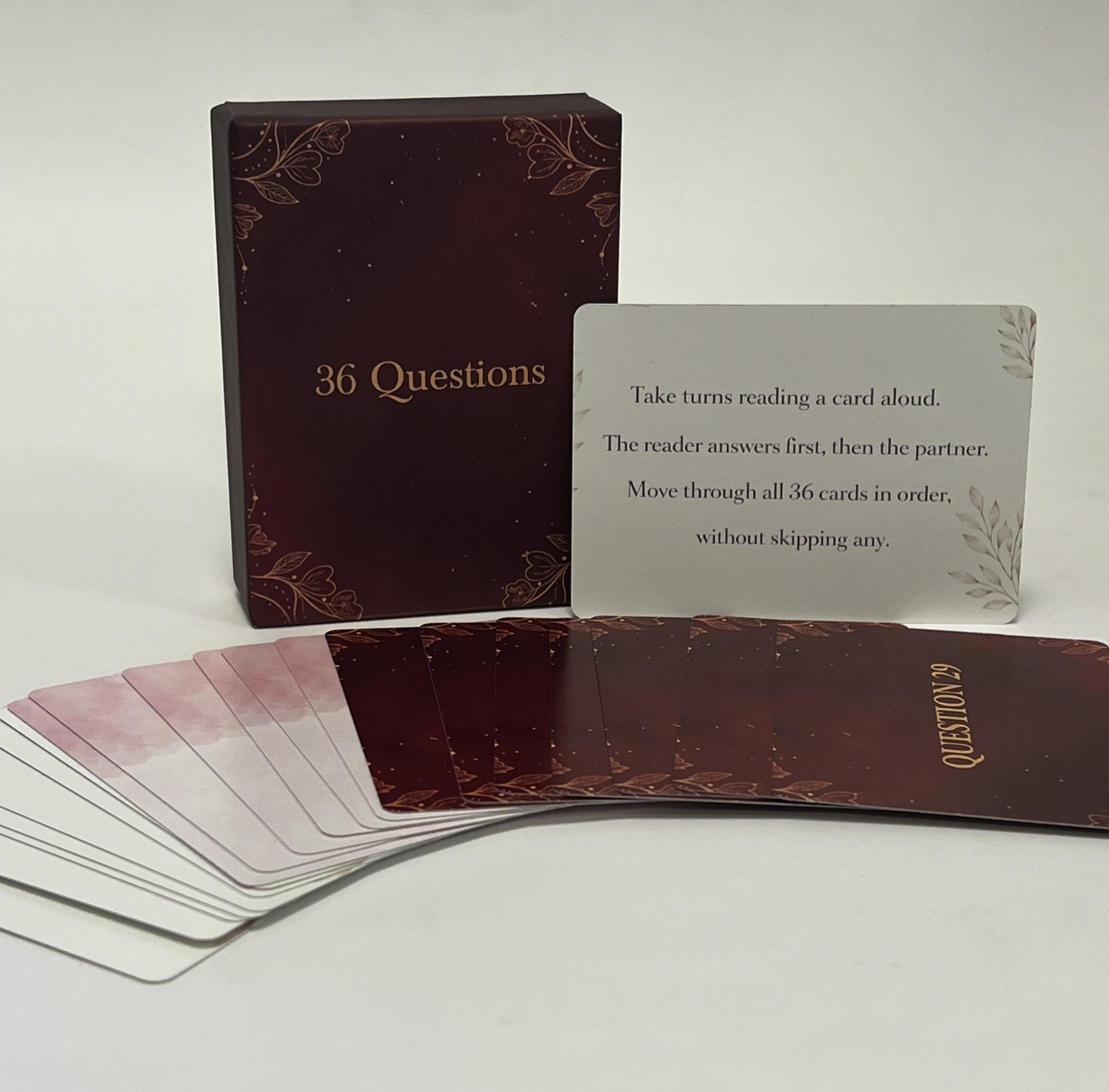 36 Love Questions box with instruction card and a fan of question cards